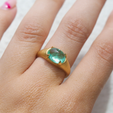 Oracle Ring with Oval Cabochon Emerald