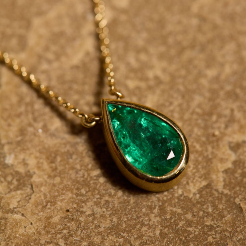 Aether with Pear Shape Emerald - 18ct Gold