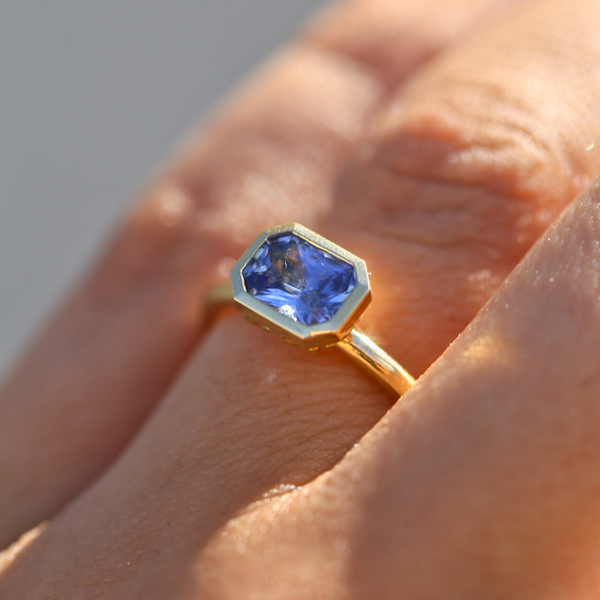 Iris with Radiant Cut Blue Sapphire - 18ct Gold